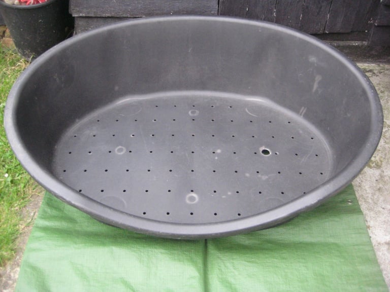 image for Large Durable Plastic Dog Bed for £5.00