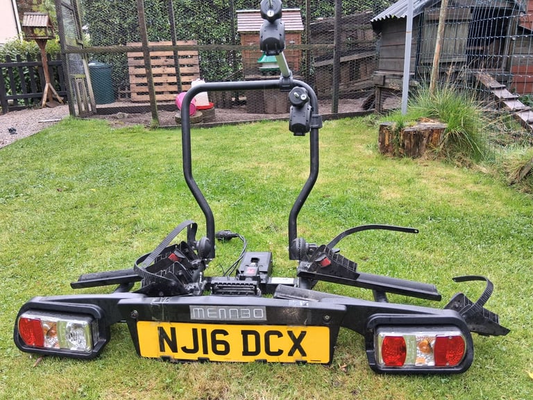Menabo towbar mounted bike rack. Quality built to hold any bike in particular heavier E-Bikes