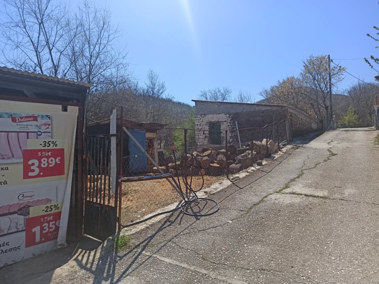 Greece - land with storage/house for sale in Central Greece close to Lake Plastira