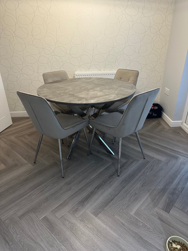 Grey marble effect glass top dining table with 4 grey suede chairs