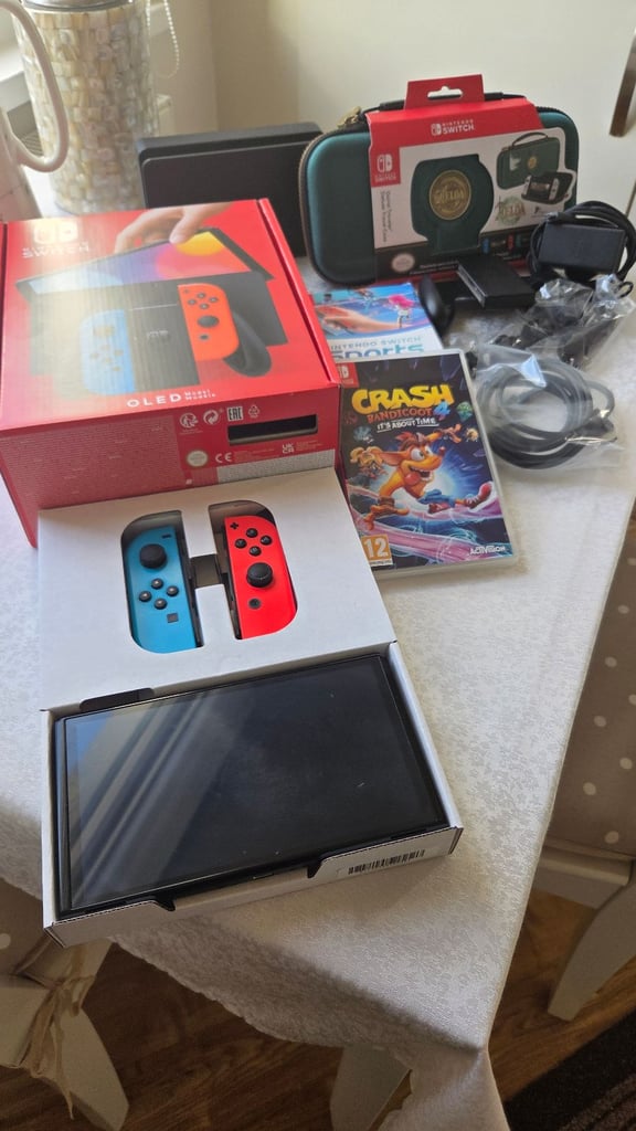 Nintendo switch oled and 2 games