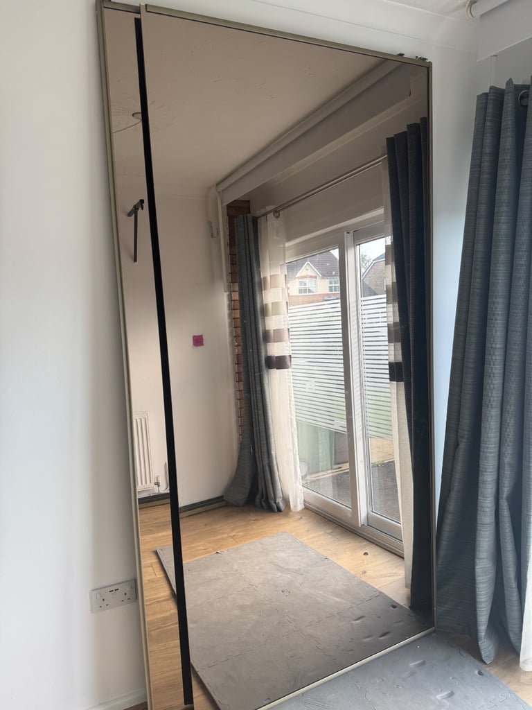 Sliding mirrored wardrobe doors