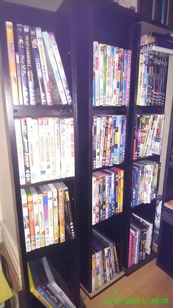 image for DVD/CD units, shelves with some DVDs to go