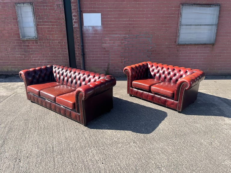 2 x Red chesterfield sofas 