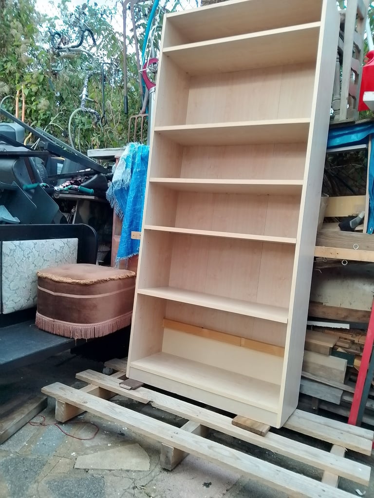 Very tall shelving unit in new condition spotlessly clean inside and out 