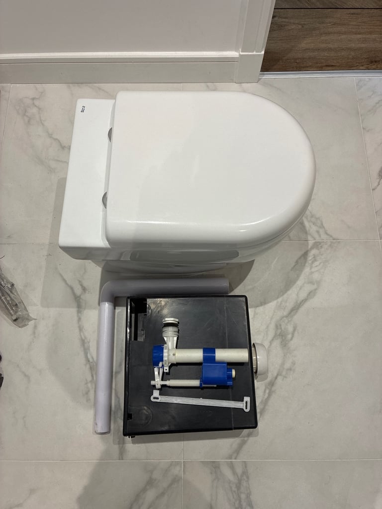 image for Soft close toiler with hidden cistern 