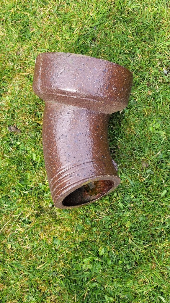 Glazed clay bend drainage pipe