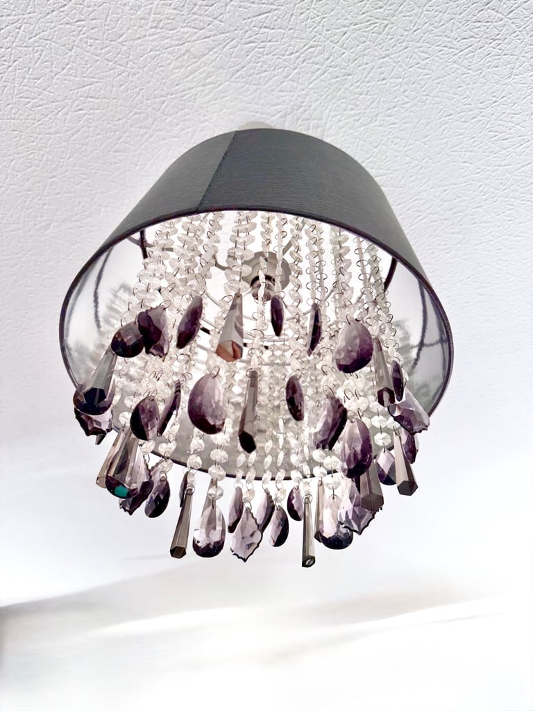 Grey pleated satin shade with drop cristals Measuring 35x 35 cm. Drop crystal plastic 