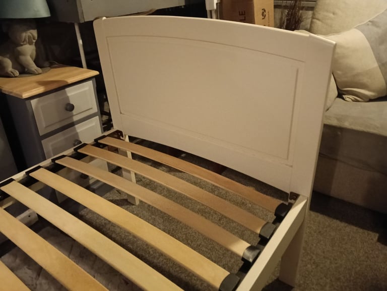 White wooden single bed and mattress 