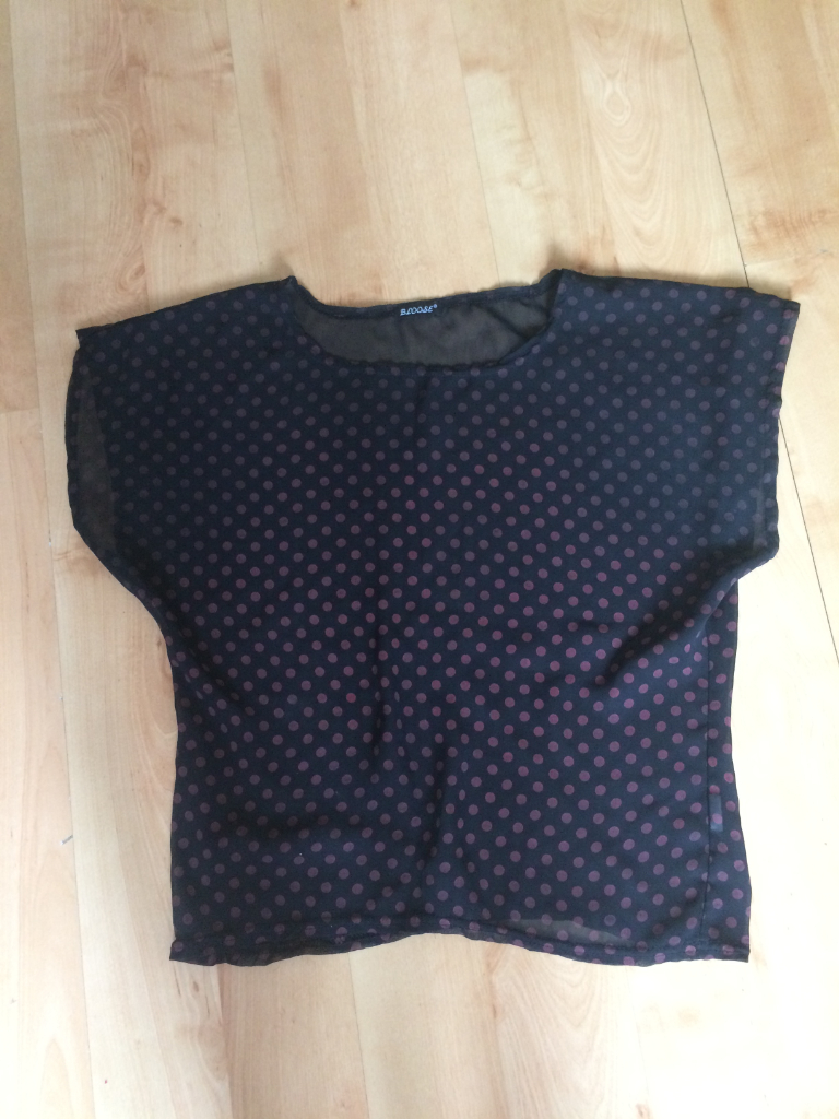 Attractive polka dot top size 12/14 unworn
