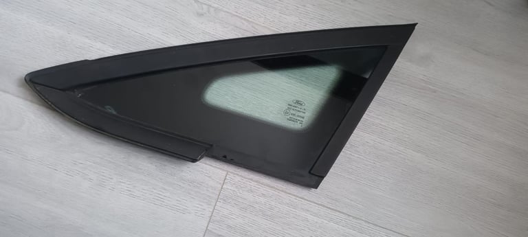 Fiesta 14 last front quarter glass £35