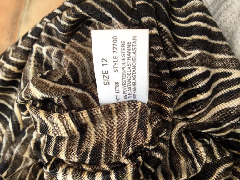 Size 12 ladies top. Lovely material. £3. Torquay or can post.