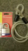 NEW heavy duty padlock and hardened steel cable - absolutely brand new