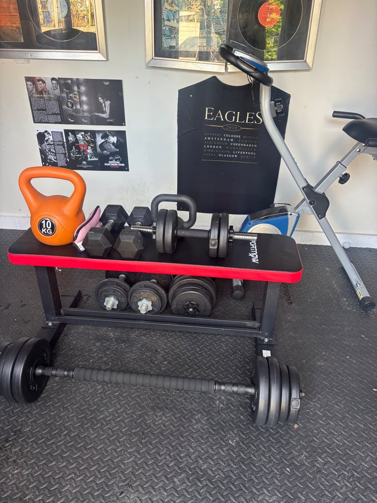 Gym weights with exercise bike.