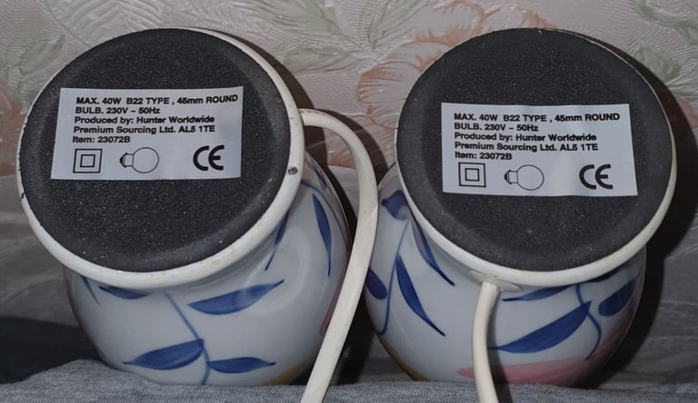 2 MATCHING CERAMIC LAMPS WITH YELLOW/PINK FLOWER DESIGN