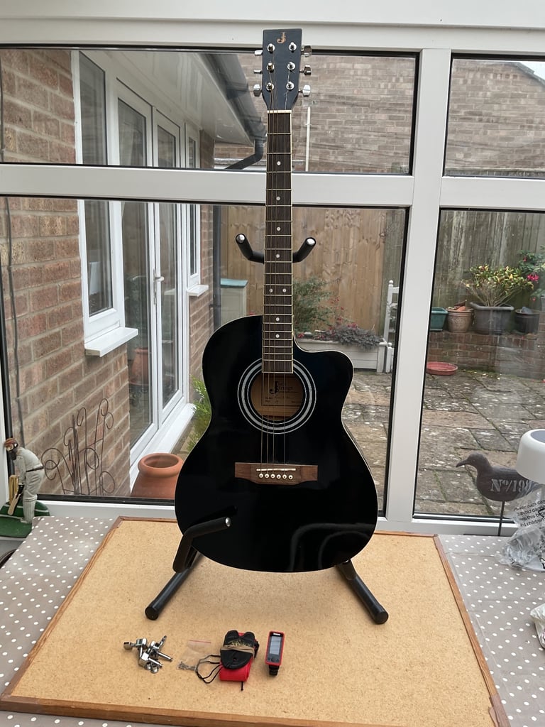 image for ACOUSTIC GUITAR PLUS STAND, TUNER, STRAP AND TUNING PEGS