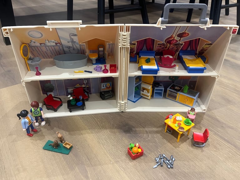 Playmobil folding dolls house with huge amount of Playmobil bits