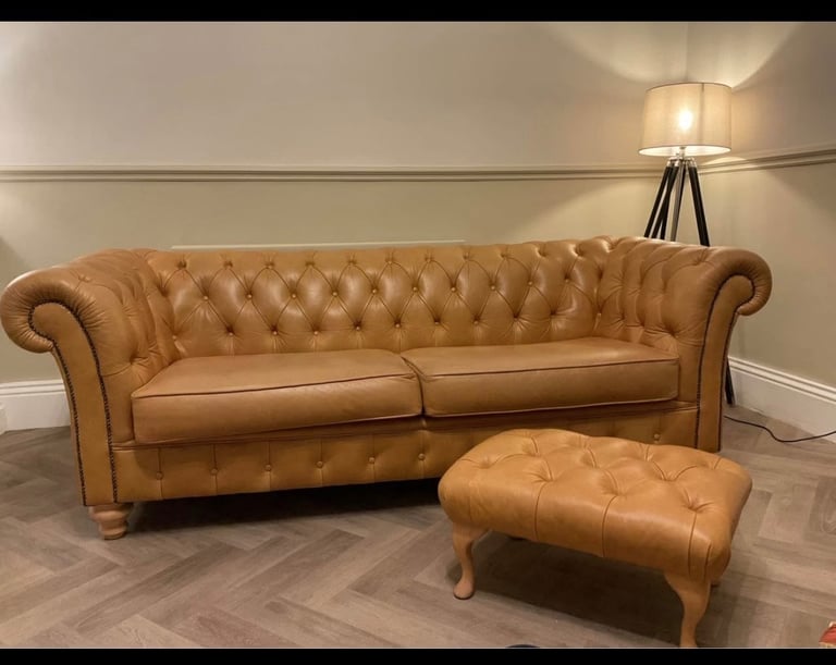 Tan Chesterfield sofa  and footstool 