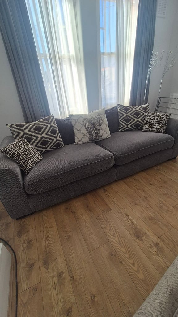 4 seater Sofa with footstall