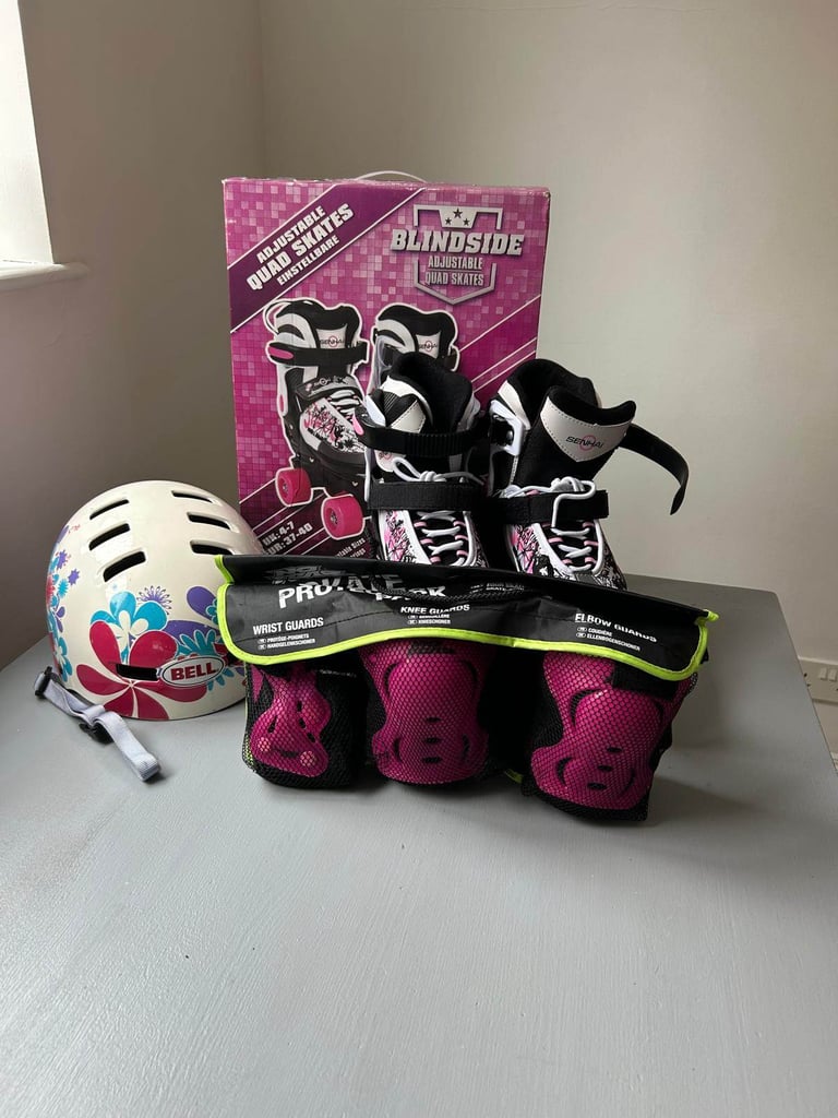 Blindside adjustable quad skates size 4-7 with safety gear.