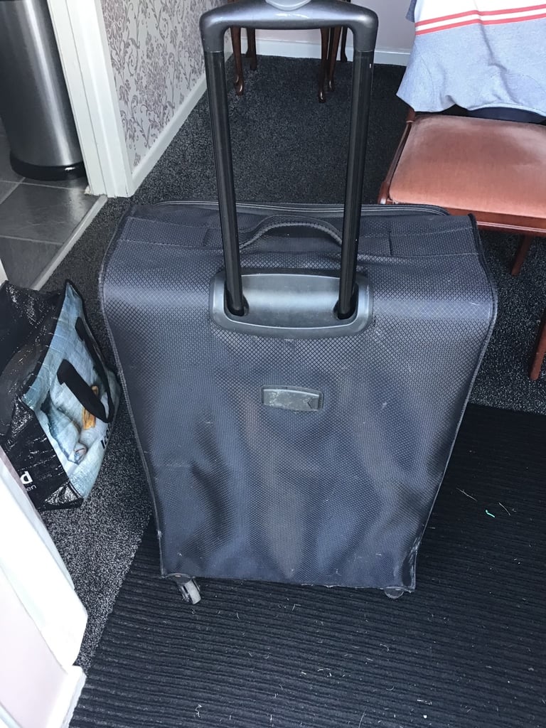 Used Lightweight large suitcase 28” long 18”wide 10”depth  Good for Storage or holidays