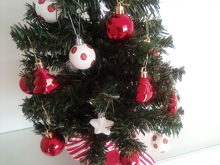 As new small Christmas tree with hanging baubles etc included.