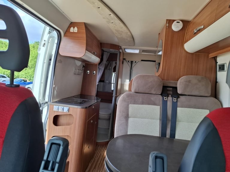 Adria Twin SF. 2013. Rear French Bed. Half dinette hosts 5.