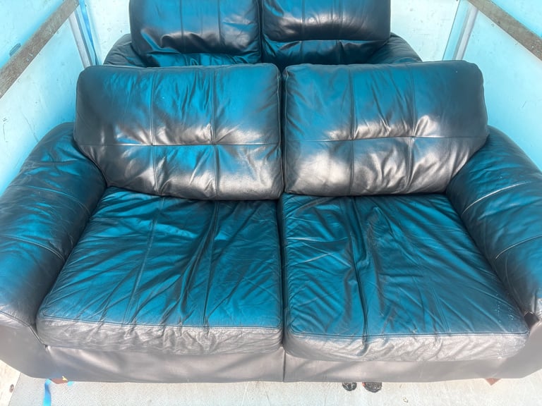 2 x blue 2 seater leather sofas . Free to collect 