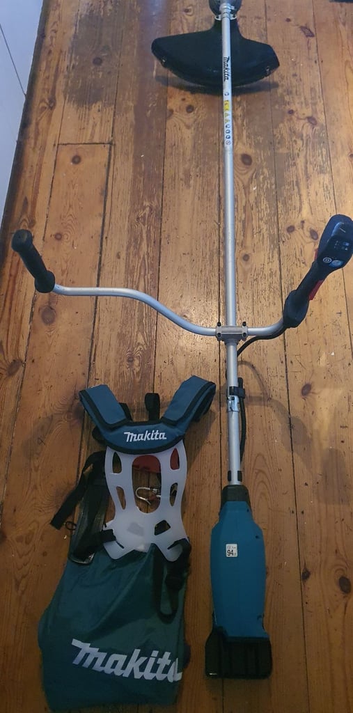 image for For sale is Makita DUR369A 36V grass trimmer/shrubs cutter. 