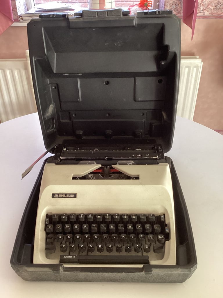 Adler typewriter in case and in excellent condition 