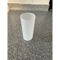 24 x small plastic cups/pots.
