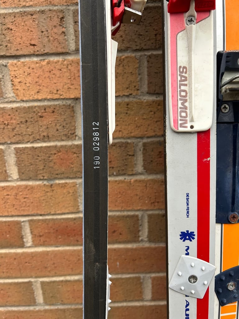 Various cross country skis, poles and boots