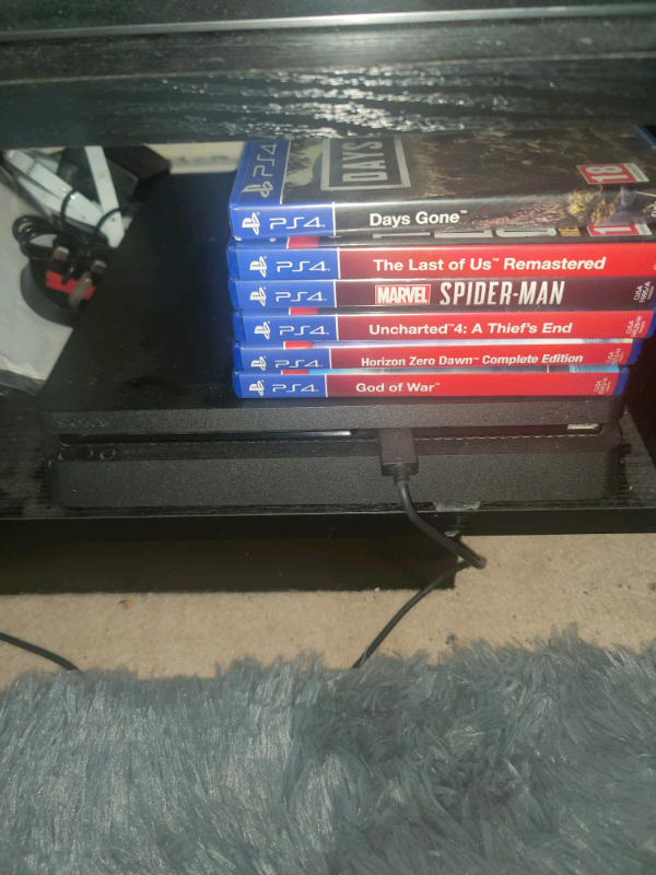 PlayStation 4 Slim w/ 6 games, controller