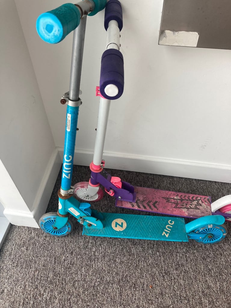 kids bike and two scooters 
