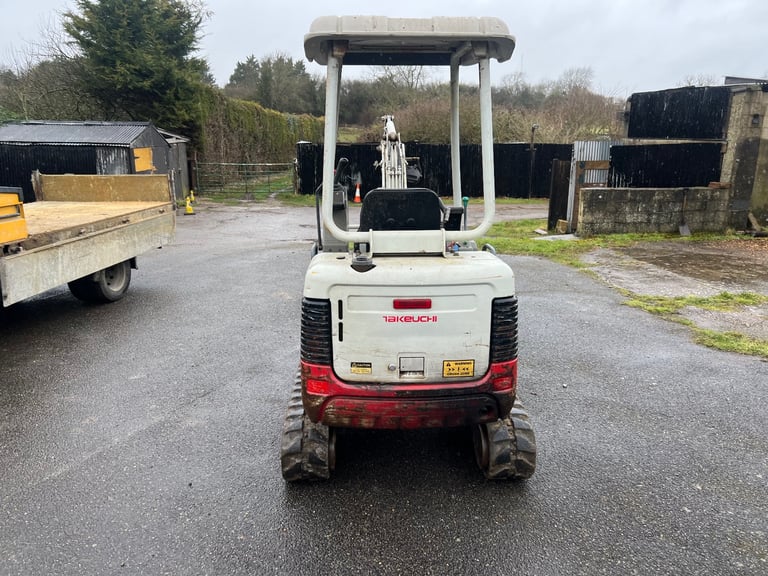 Takeuchi TB 016 digger with trailer and breaker