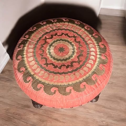 Beautiful footstool with wooden legs