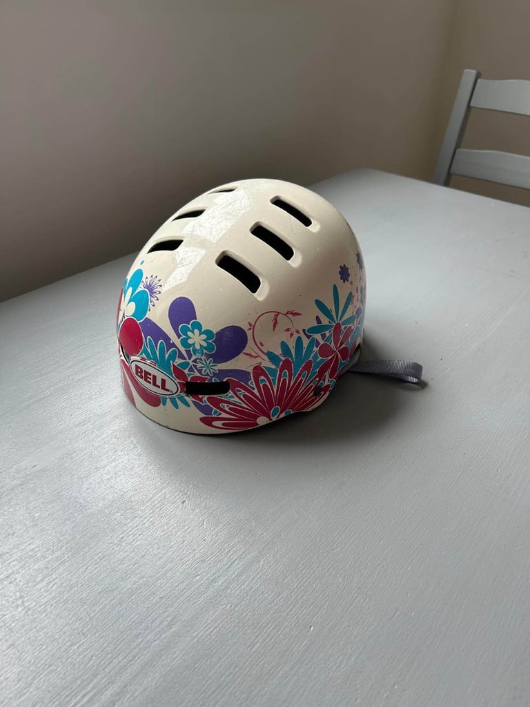 Blindside adjustable quad skates size 4-7 with safety gear.