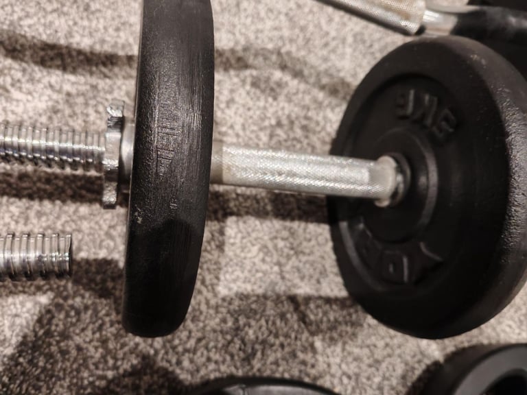 50kg of free weight, 2 x dumbbell bars, and 1 x curl bar