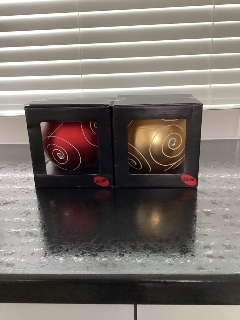 Two new boxed large Christmas baubles £1.50 each