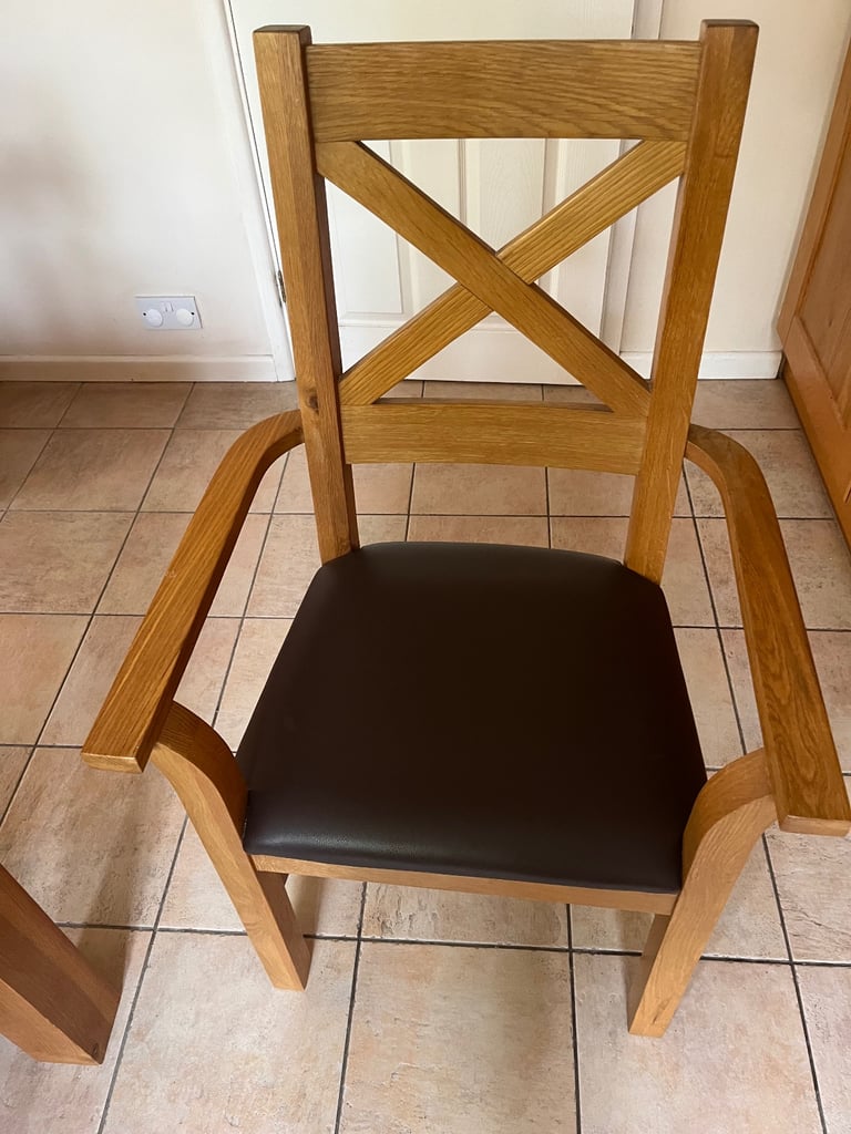 Solid Oak 8 seater table and chairs 