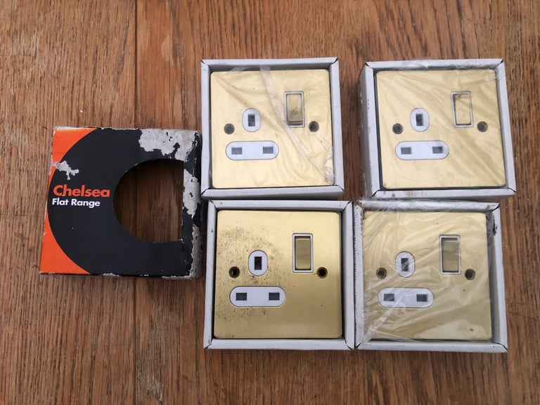 Chelsea flat range single brushed brass switched sockets