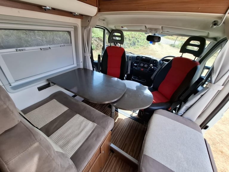 Adria Twin SF. 2013. Rear French Bed. Half dinette hosts 5.