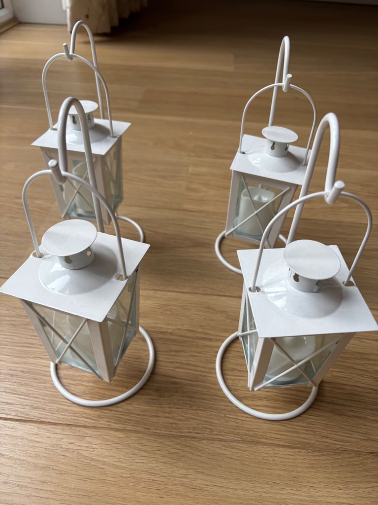 image for Four small white metal tea light lanterns 