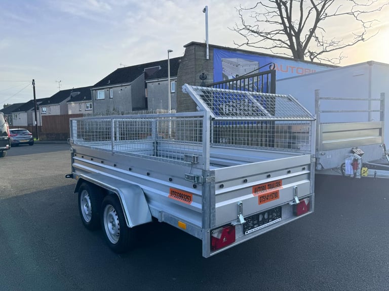 BRAND NEW 10ft x 5ft TWIN AXLE TRAILER WITH 40CM MESH 1300KG BRAKED