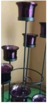 7 purple glass tea light on metal stand