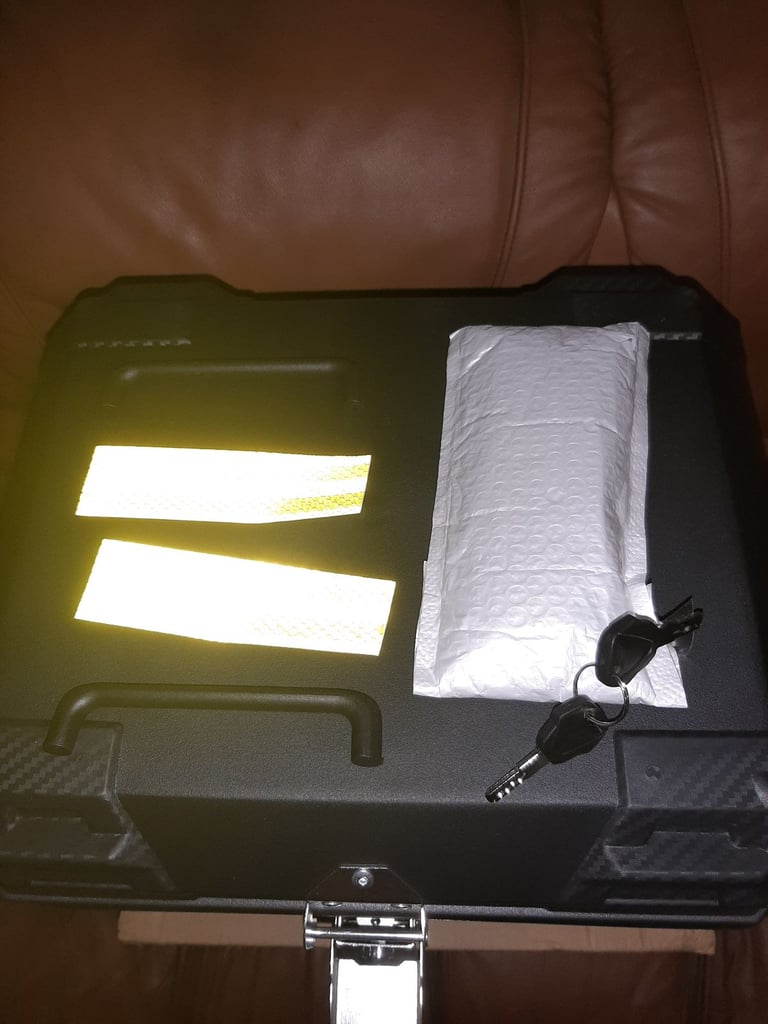 Brand new 45 litre  top box complete  with all hardware and 2 keys never fitted 