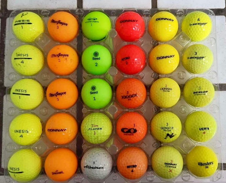 30 coloured used golf balls