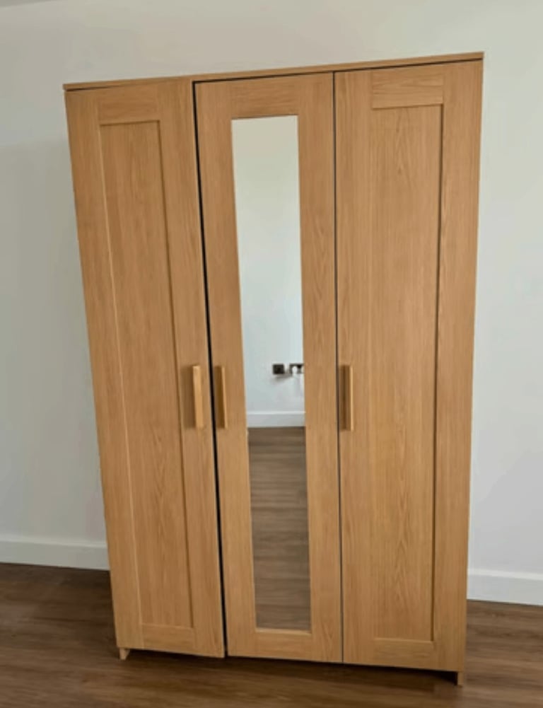 Brimnes 3-door ikea wardrobe - brown/oak.