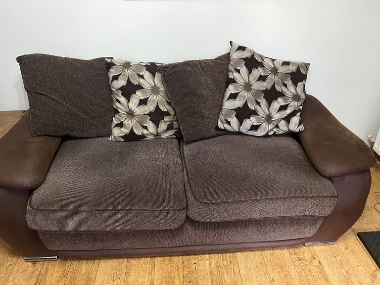 Large 2 seater with cushions.