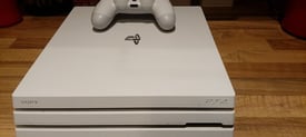 PS4 PRO 1 TB WHITE 1 CONTROLLER AND GAMES
